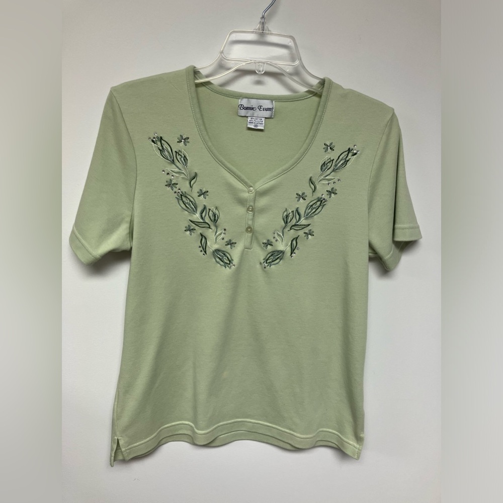 Bonnie Evan’s, top, light green, M.